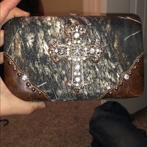Never been used western wallet.  Camo with bling.